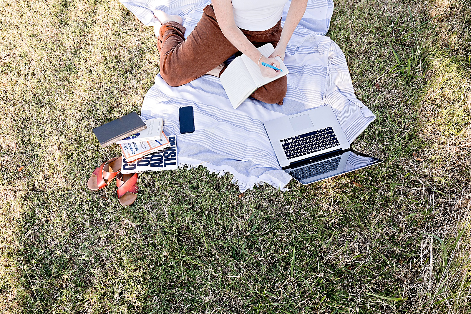 Website copywriter Dianna Robicheau of Rise Copy Co. writing about putting pricing on your website